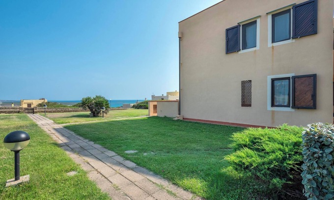 La Pelosa House | Vacation Home "Pergola 707" a few meters from the Beach with A/C & Private Terrace