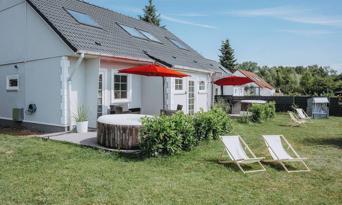Luetow House | Vacation homes island Usedom house Mila 6 -view of the Achterwasser- sauna, whirlpool