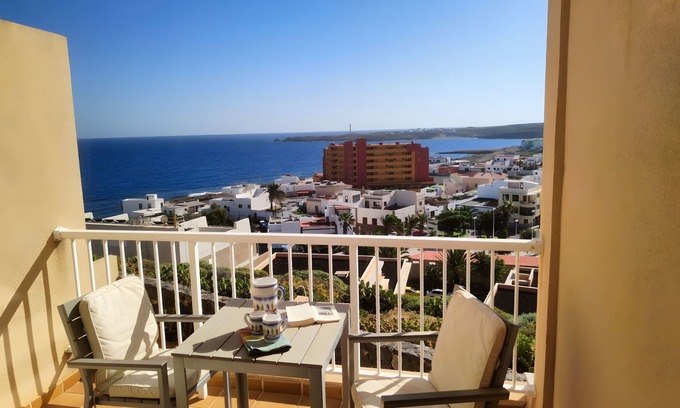 Poris de Abona Apartment | Vacation 'Vista Bahia' with Sea View, Shared Pool and Wi-Fi