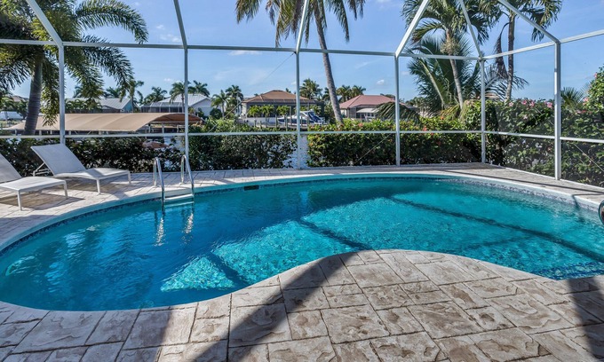 Pelican House | VILLA BELLAGGIO - Western Exposure, Gulf Access, Pool, Boatlift, 3 bed & 3 bath