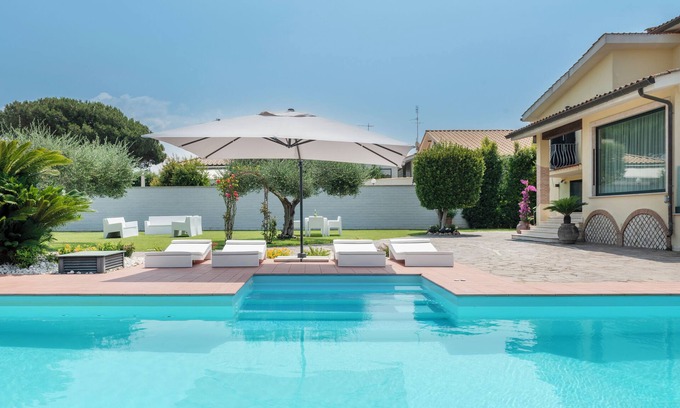 Zona XXX Castel Fusano Villa | Villa dei Sogni - Duplex with esclusive pool and garden
