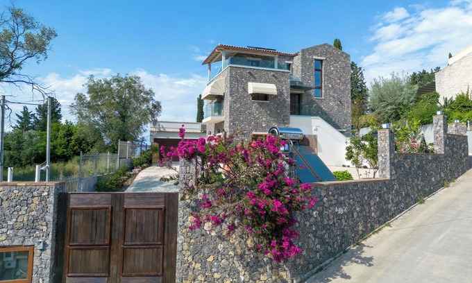Corfu Town Villa | Villa Nera: Luxurious seaview retreat in Corfu's Kefalomandouko Hill.