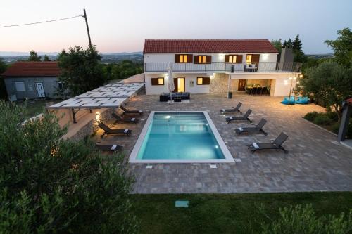 Benkovac Villa | Villa Pietra- Modern rustic poolside oasis