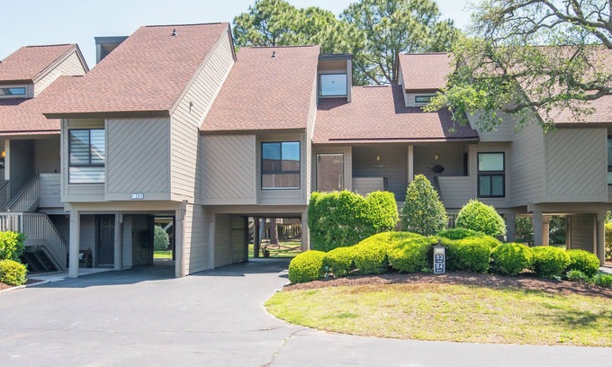 Litchfield by the Sea Condo | Villa with landscape view and pool access located within gated Litchfield By the Sea community.