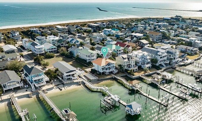 South End House | Waterfront 5 BR home w/incredible views, dock, boat slips, & elevator!