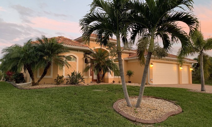 South Gulf Cove House | Waterfront Canal/Palms Oasis in South Gulf Cove