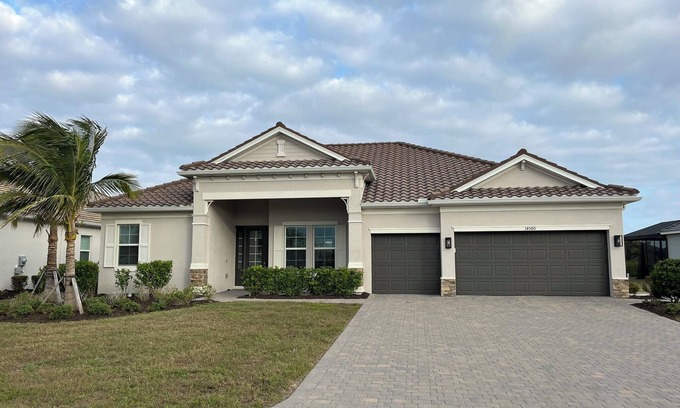 South Gulf Cove House | Waterfront, gated community, heated pool & spa, boat lift, Gulf access, home gym
