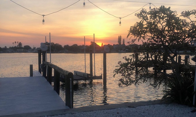 Madeira Beach House | Waterfront home with private dock and two-minute walk to the beach.