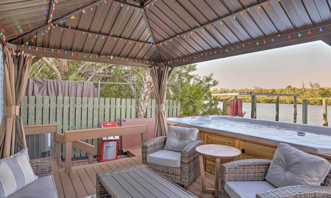 Sunset Reef Cottage | Waterfront Oasis w/ Views, Dock & Hot Tub!