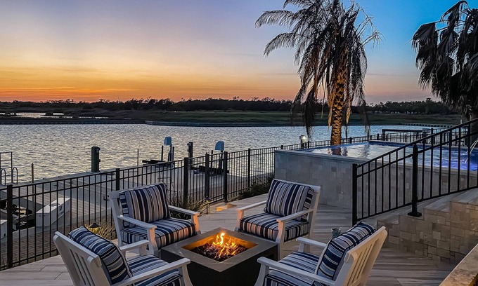 Rockport House | Waterfront paradise with private pool, dock, poolside TV & multi-TV game room