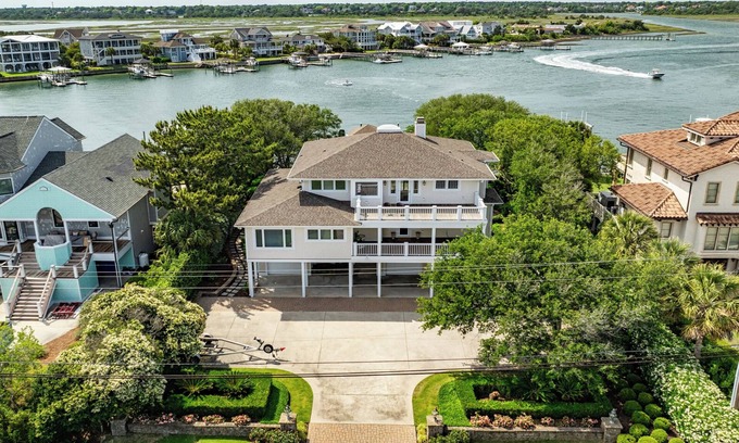 Shell Island House | Waterfront Retreat steps from Beach Access, 2 Boat Slips, Hot Tub & Elevator