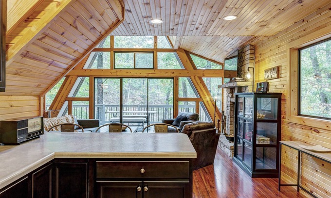 Wright City Ski Chalet | Waterside Cottage by Sarah Bernard with Firepit, Private Dock, and Hot Tub