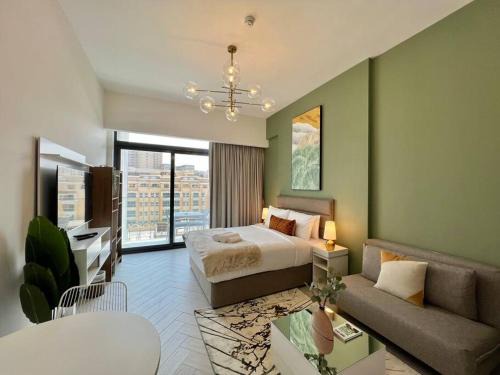 Jumeirah Village Circle Apartment | Waves - Ideal Dubai Retreat, Elegant Studio in Oxford 212