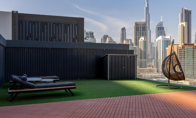 Business Bay Apartment | Waves - Spacious 2BR Apartment with Burj Views & Terrace