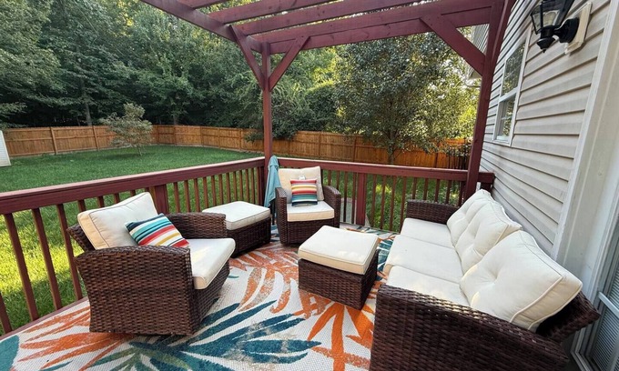 Greensboro House | Welcome to The Clovelly, a spacious 2-story vacation home that blends charm with modern comfort. Perfect for families, friends, or groups, this cozy retreat features inviting living spaces, a fully equipped modern kitchen & comfortable bedrooms.