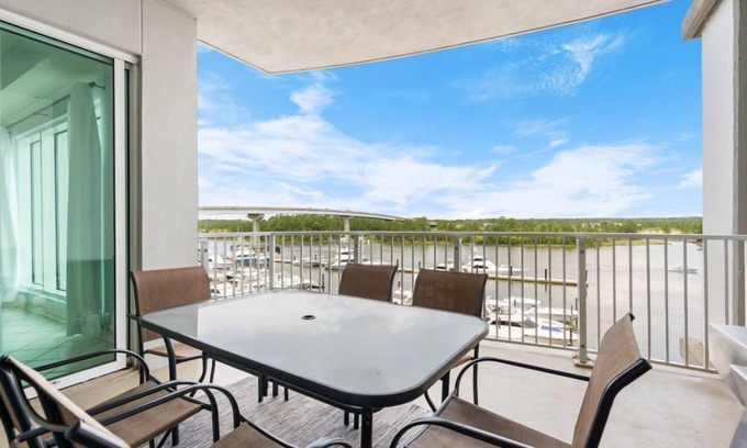 Orange Beach Condo | Wharf 412- Where Waterfront Serenity Meets Downtown Energy!