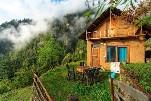 Banjar House | Whispering Pines Cottages Cabin by Bastiat Stays