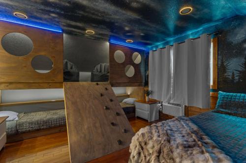 Bryant House | Wood Haven Cabin with a hot tub fire pit & indoor pool