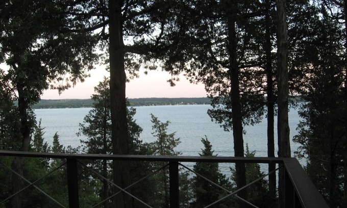 Green Lake Cabin | Woodsy Lakefront Retreat high above Green Lake