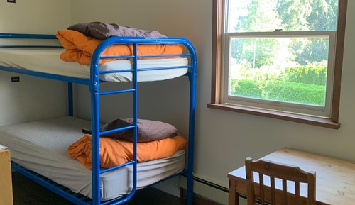 2 people bunkbed share washroom