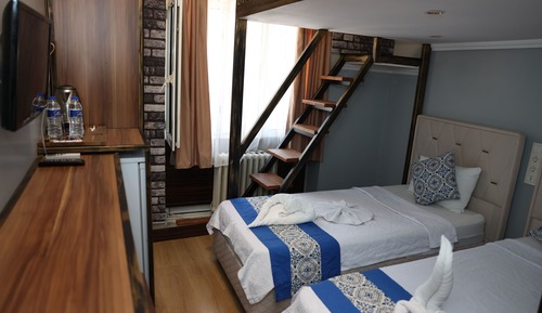 Deluxe Triple Room
