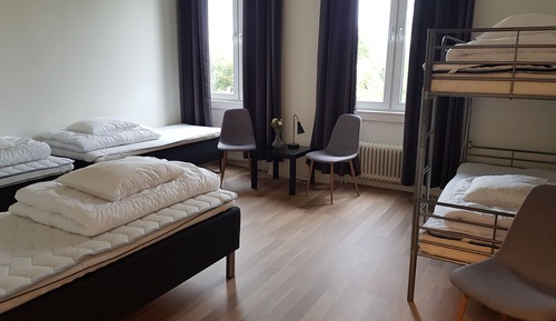 Family Room - 3 Single Beds and 1 Bunk Bed - Shared Bathroom