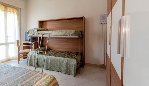 Family Room, Multiple Beds, Balcony, Courtyard Area