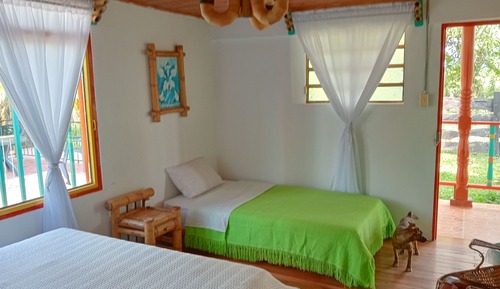 Deluxe Triple Room, Patio, Garden View