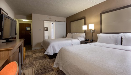Room, 2 Queen Beds, Non Smoking, Refrigerator & Microwave (Roll-in Shower)