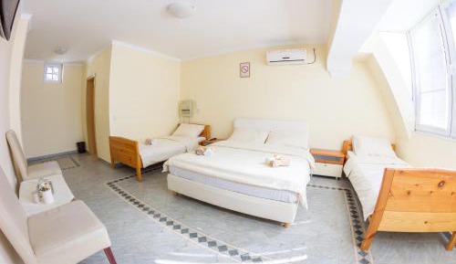 Quadruple Room with Private Bathroom