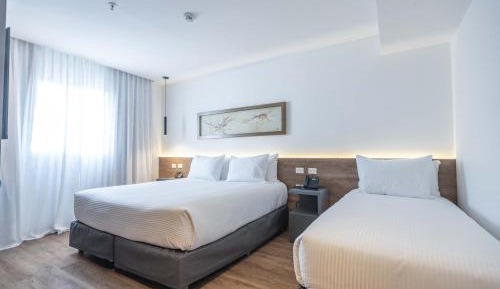 Standard Room with One King Bed and One Single Bed - Non-Smoking