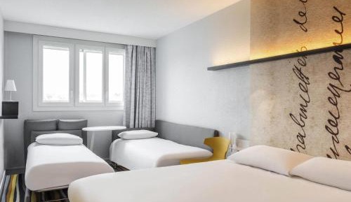 Quadruple Room with One Double Bed and Sofa Bed