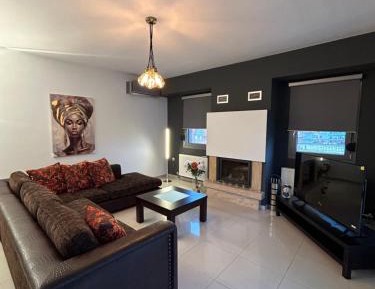 Three-Bedroom Apartment with Balcony