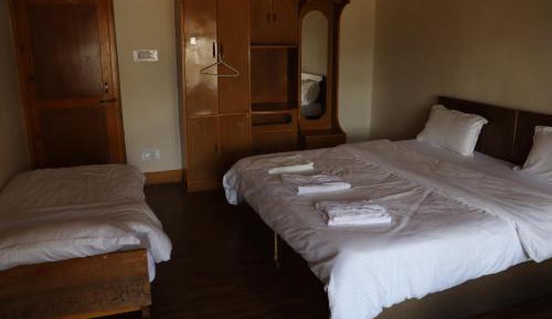 Quadruple Room with Private Bathroom