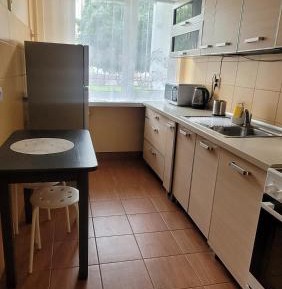 Three-Bedroom Apartment with Balcony