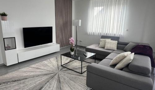 Three-Bedroom Apartment with Balcony