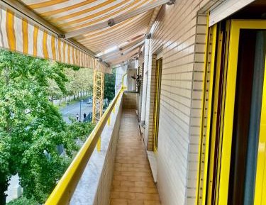 Three-Bedroom Apartment with Balcony
