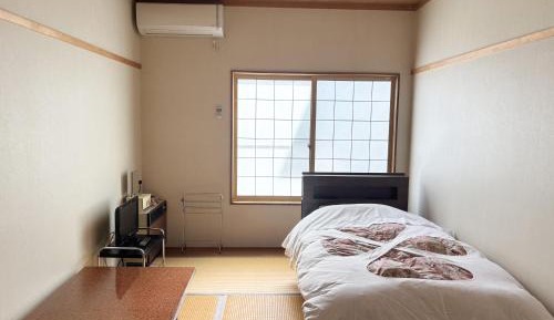 Single Room with Shared Shower and Toilet