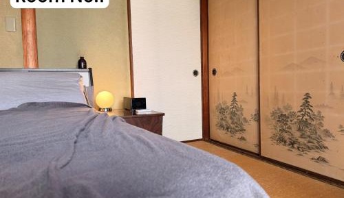 Queen Room with Shared Bathroom