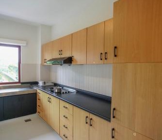 Four-Bedroom Apartment with Balcony 