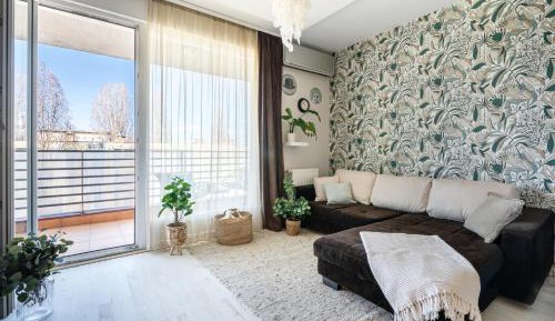 One-Bedroom Apartment with Balcony and City View