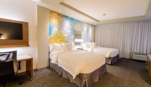 Large Queen Room with Two Queen Beds and Sofa Bed