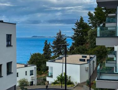 One-Bedroom Apartment with Balcony and Sea View