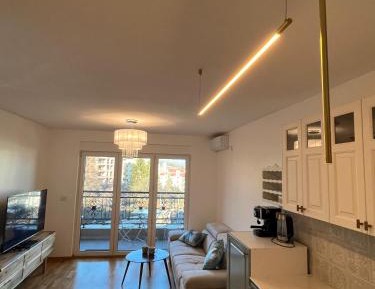 One-Bedroom Apartment with Balcony and City View
