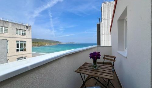 One-Bedroom Apartment with Balcony and Sea View