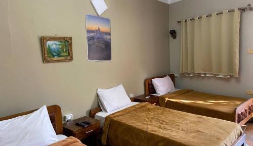 Quadruple Room with Private Bathroom