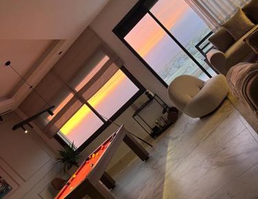 Three-Bedroom Apartment with Sea View