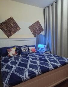 Queen Room with Shared Bathroom