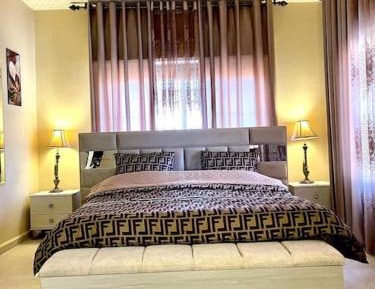 Three-Bedroom Premium Apartment with Balcony