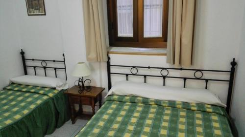 Double Room with Extra Bed and Shared Bathroom